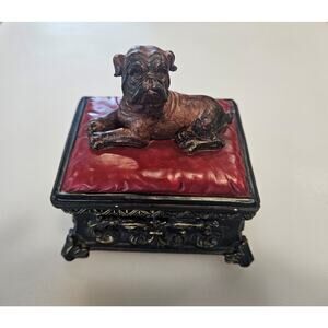 Bull Terrier sculpture vintage Resin trinket box dog laying on burgundy seat.